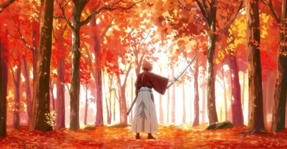 Look at the image of Kenshin standing up amidst a sea of leaves after a period of relaxing on the ground.